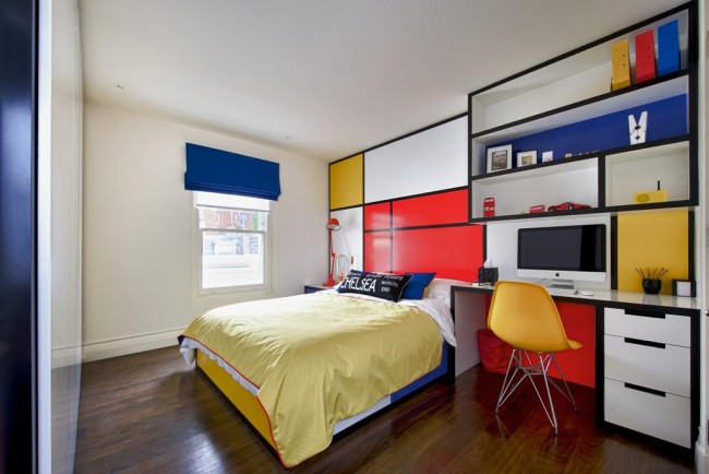 Геометрическая тема оформления комнаты для подростка или студента, где, кроме белого, задействованы три "основных" цвета