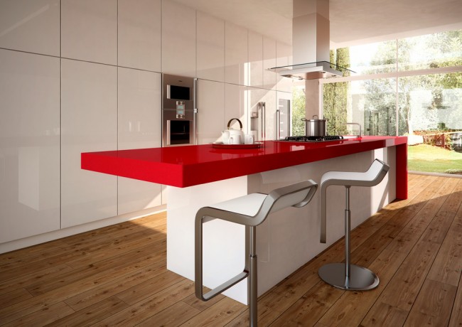 Минималистичный, лаконичный интерьер белой кухни с ярким акцентом - столешницей острова из ярко-красного искусственного камня