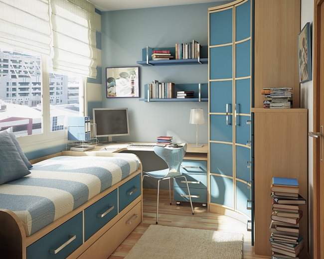 Угловой шкаф голубого цвета в небольшой спальне