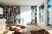 Фото 9 Книжные шкафы и библиотеки для дома: как выбрать и разместить правильно